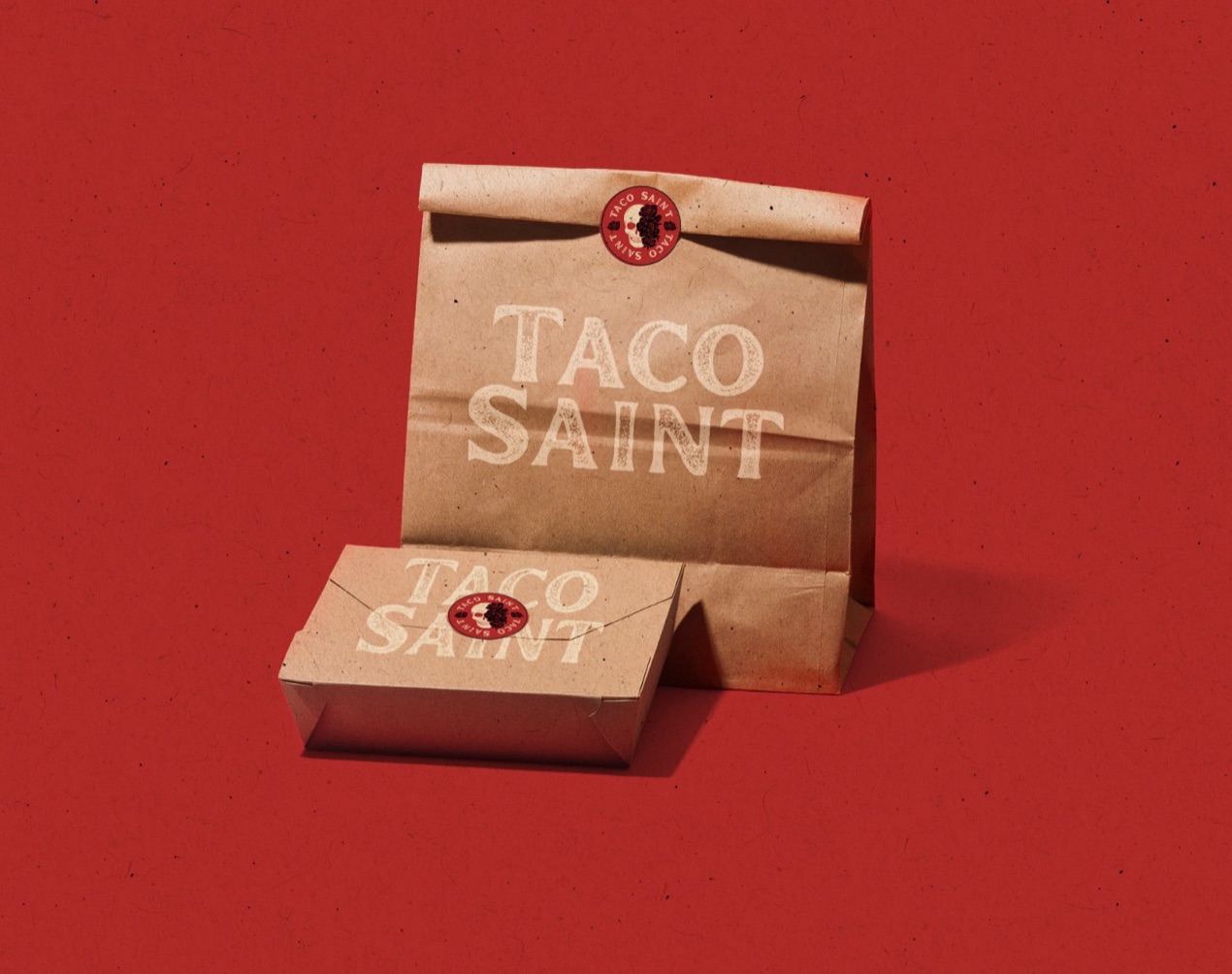 Taco Saint branded takeout bag and box